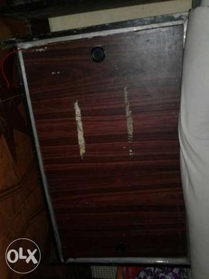 Wooden cupboard in good condition... for multi