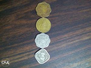 's 4 old coins with golden 2 coins in color