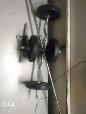 3kg * 4 plates, Steel Rods weighing 3 and 5 kgs
