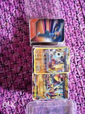 A set of Pokémon cards of normal one and mega