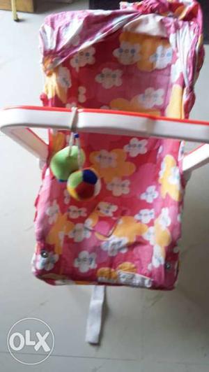 Baby's White, Yellow And Pink Floral Bouncer Seat
