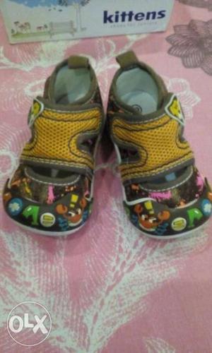 Baby's Yellow And Multicolored Shoes