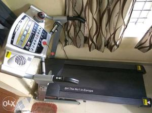Black And Gray Electric Treadmill