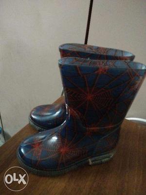 Black and red rain boots for 500rs and blue one