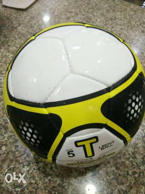 Black,yellow, And White T Brand Soccer Ball