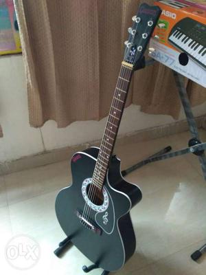 Brand new givson guitar with bag plectrums and 1