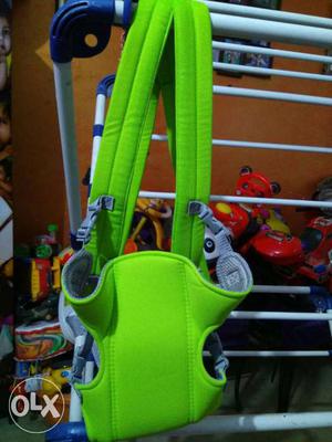 Brand new green baby carrier