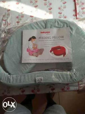 Brand new, unused Feeding Pillow selling at