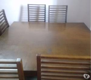 Gently used first grade 8 seater dining table for sale
