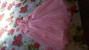 Girls 5 to 7 years long baby pink gown.