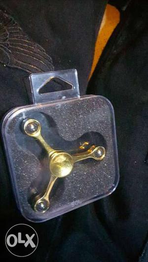 Gold Three-bladed Fidget Spinner In Case