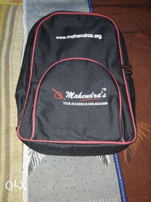 Mahindras..org. black waterproof backpack not