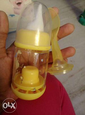 New not used Yellow Feeding Bottle