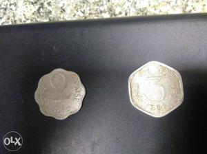 Old Indian coins like 2 and 3 paise printed on