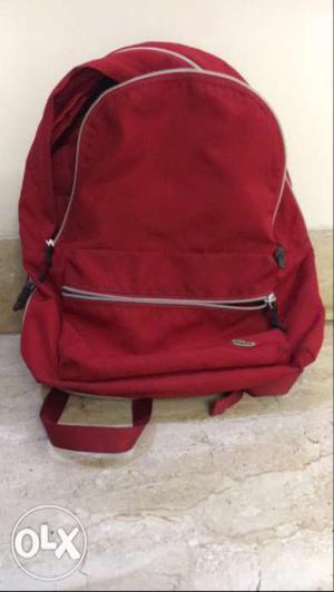 Red Lacoste backpack