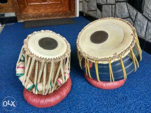 Two White, Black, Blue And Brown Tabla Drums