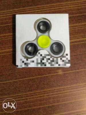 White And Green Fidget Spinner In Box