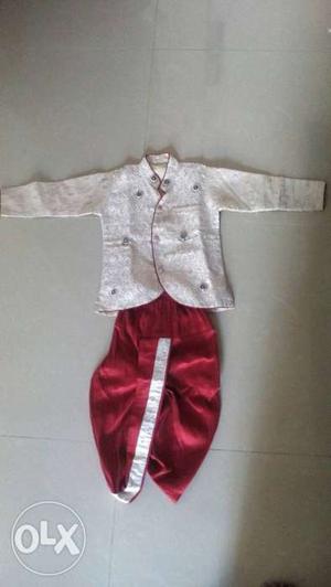 White Sherwani And Red Pants