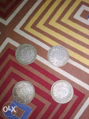 4 one rupee indian coins of 
