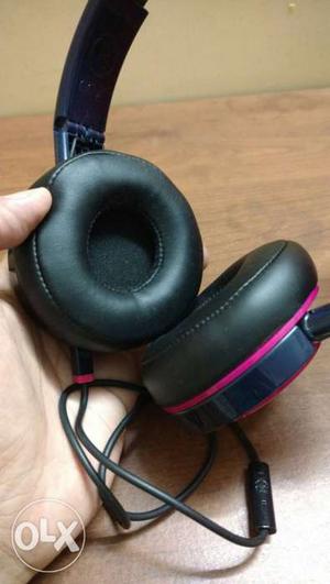 Black And Red Corded Headphones