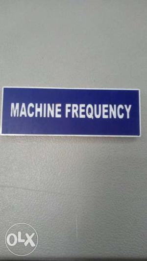 Blue And White Machine Frequency Signage