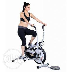 Cycling machine with dumbells and twister attached
