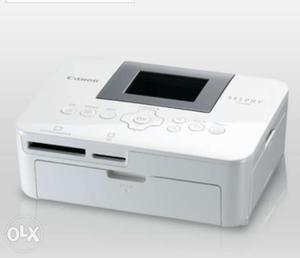 Gray And White Canon Selphy Photo Printer