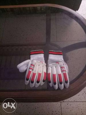 Pair Of White-and-red SS sunridged gloves