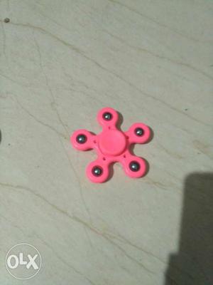 Pink colour spinner very fast and smooth