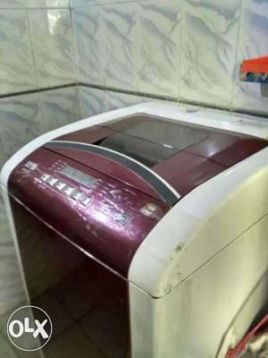 Red And White Top-load Washing Machine