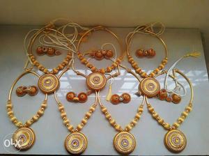 Seven Brown Necklaces