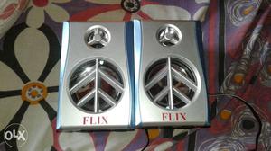 Two Gray Flix Speakers