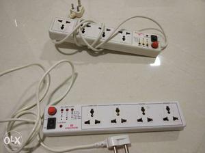 Two White Corded Power Strips