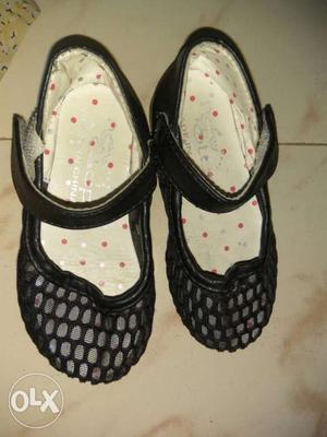 Baby's Pair Of Black-and-white Flats
