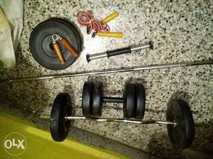 Black And Stainless Steel Barbells with 40 kg weight and