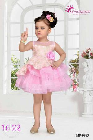 Brand new pink colored elegant party dress for