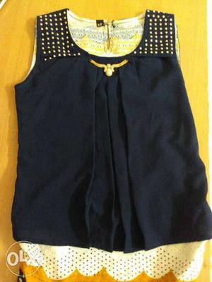 Branded and completely new unworn dress with trouser for 4+