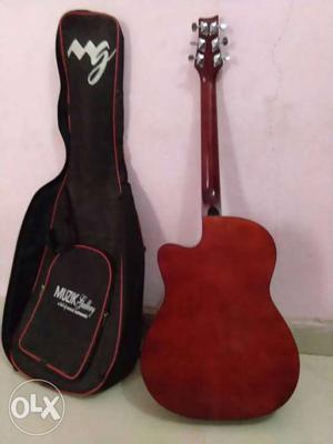 Brown Cutaway Acoustic Guitar With Gig Case
