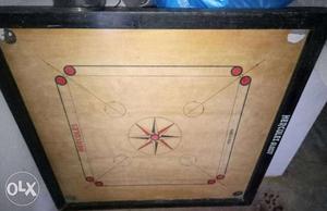 Carrom board with all the coins good condition