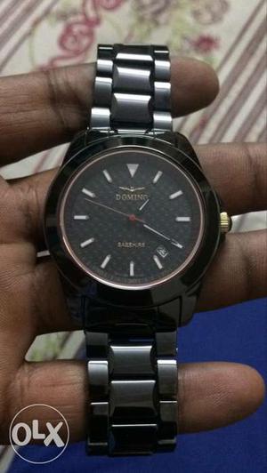 Domino original black ceramic watch in new