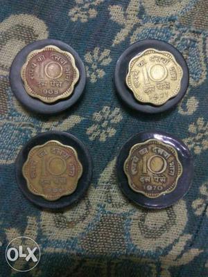 Four Scallop Edge Coins