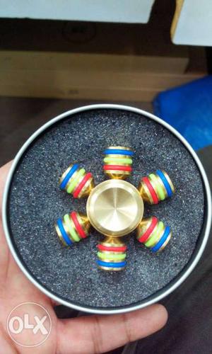Gold-colored Six Sided Fidget Spinner In Case