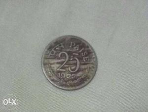 It is a bold 39 years old 25 paise Indian coin