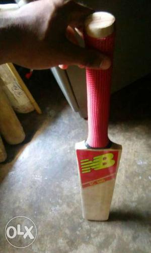 Its A New Balance real cricket bat of Kashmir Willow.