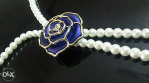 London made Pearl stone long chain with blue rose