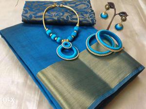 Pair Of Blue And Gold Jhumkas With Necklace And Bangles