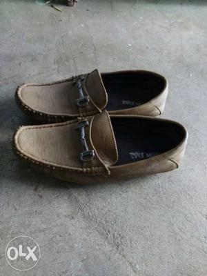 Pair Of Brown Loafers