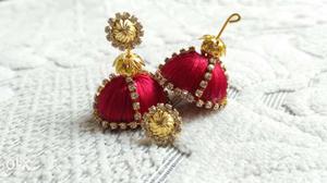 Pair Of Crystal Embellished Gold-and-red Jhumka Earrings
