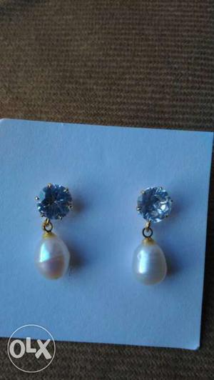 Pair Of Silver-and-blue Dangling Earrings