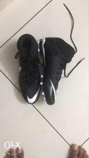 Pair Of White-and-black Nike Cleats